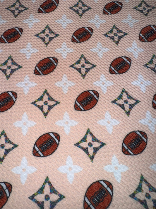 LV football bullet fabric yard